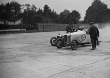 Salmson and Amilcar competing in a race at a Surbiton Motor Club meeting, Brooklands, Surrey, 1928. Artist: Bill Brunell