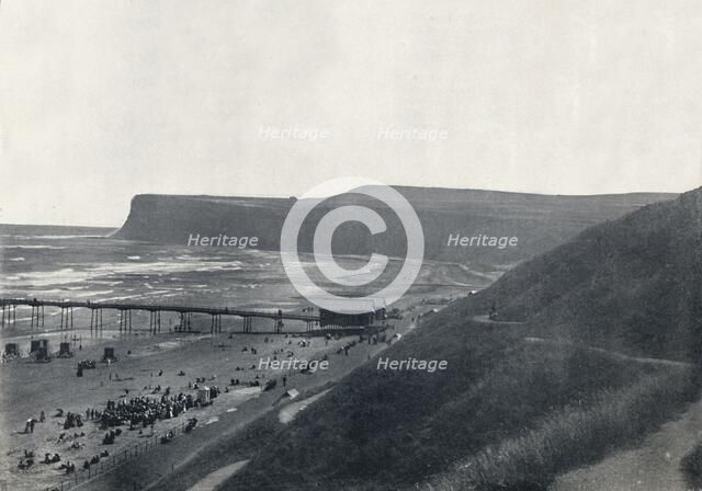 'Saltburn - View of the Cliffs, Beach, and Pier', 1895. Artist: Unknown.