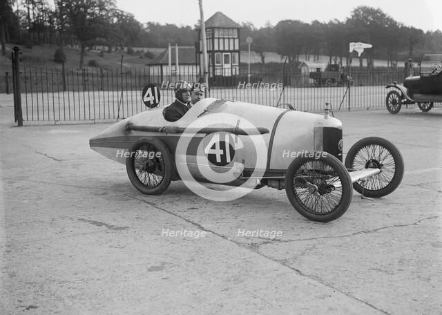 Sammy Davis in his AC at the JCC 200 Mile Race, Brooklands, Surrey, 1921. Artist: Bill Brunell.