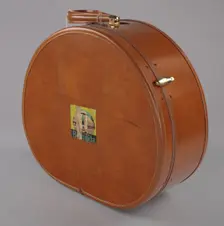 Samsonite hat box suitcase from Mae's Millinery Shop, 1941-1994. Creator: Samsonite
