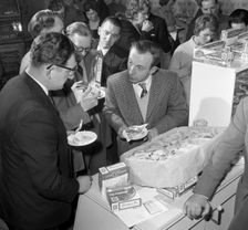 Sampling chicken patties, Wilsic, near Doncaster, South Yorkshire, 1961. Creator: Michael Walters
