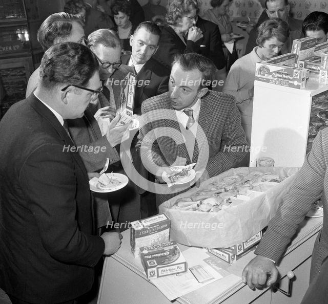 Sampling chicken patties, Wilsic, near Doncaster, South Yorkshire, 1961. Creator: Michael Walters.