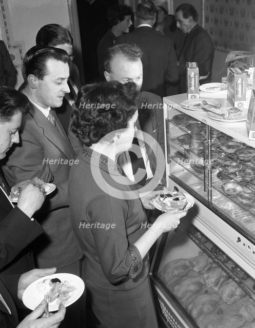 Sampling chicken patties, Wilsic, near Doncaster, South Yorkshire, 1961. Creator: Michael Walters.