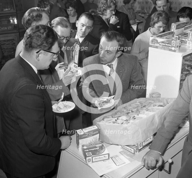 Sampling chicken patties, Wilsic, near Doncaster, South Yorkshire, 1961. Artist: Michael Walters