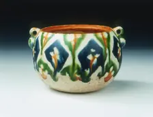 Sancai pottery jar with floral and geometric patterns, Tang dynasty, China, early 8th century. Creator: Unknown