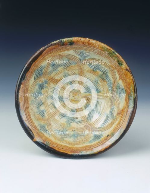 Sancai pottery mortar with floral pattern, Five Dynasties period, China, 10th century.  Creator: Unknown.