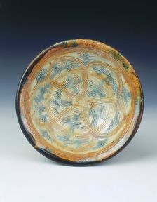 Sancai pottery mortar with floral pattern, Five Dynasties period, China, 10th century. Creator: Unknown