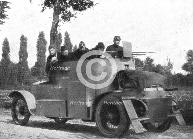 'Sans cesse en mouvement, les autos-mitrailleuses blindees harcelent les colonnes allemandes', 1914. Creator: Unknown.