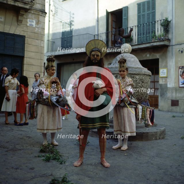 Sant Joan Pelós' and 'The Eagles', popular characters preceding the procession of the Corpus Chri…