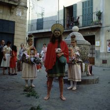 Sant Joan Pelós and The Eagles popular characters preceding the procession of the Corpus Chri…