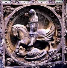 Sant Jordi medallion at the entrance of the Gothic façade of the Palace of the Generalitat of Cat…