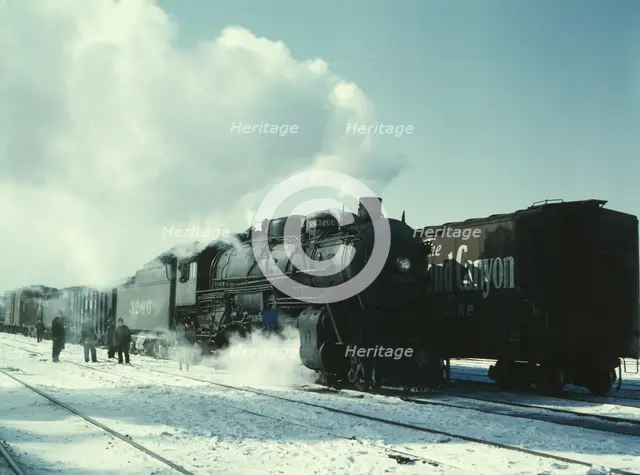 Santa Fe R.R. freight train about to leave for the West Coast from Corwith yard, Chicago, Ill., 1943 Creator: Jack Delano.