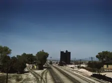 Santa Fe R.R. going through Yucca, Arizona; a watering and refueling stop, 1943. Creator: Jack Delano
