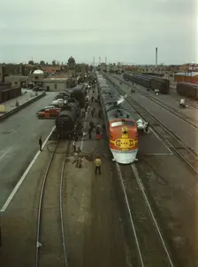 Santa Fe R.R. streamliner, the "Super Chief," being serviced..., Albuquerque, N.Mexico, 1943. Creator: Jack Delano