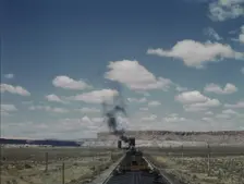 Santa Fe R.R. train stopping for coal and water, Laguna, New Mexico, 1943. Creator: Jack Delano