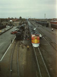 Santa Fe R.R. streamliner, the "Super Chief," being serviced..., Albuquerque, N.Mexico, 1943. Creator: Jack Delano