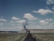 Santa Fe R.R. train stopping for coal and water, Laguna, New Mexico, 1943. Creator: Jack Delano