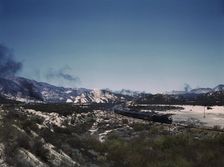 Santa Fe R.R. trains going through Cajon Pass in the San Bernardino Mountains, Cajon, Calif., 1943. Creator: Jack Delano