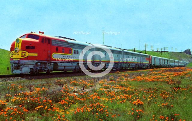 Santa Fe's 'Super Chief' passing a field of California poppies, 1956. Artist: Unknown