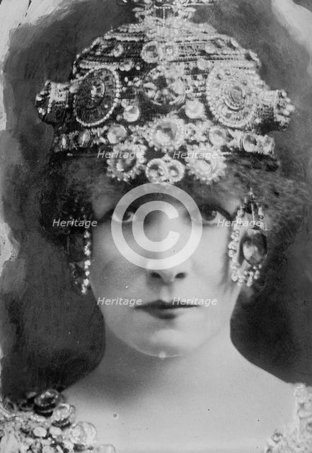 Sarah Bernhardt with elaborate headdress, 1912. Creator: Bain News Service.