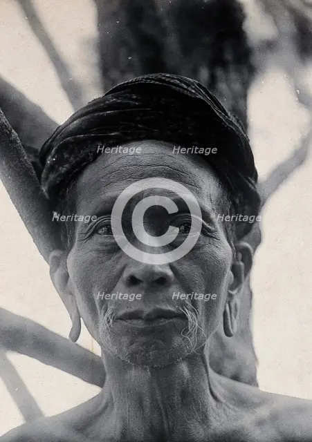 Sarawak: Tama Kulieng, a chief of the Butang Kayan River tribe, c1900.. Creator: Unknown.