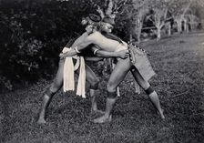 Sarawak: two Kayans wrestling, c1900. Creator: Unknown