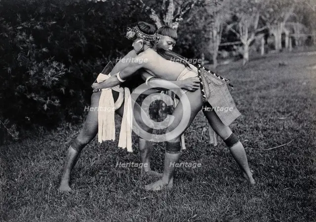 Sarawak: two Kayans wrestling, c1900. Creator: Unknown.