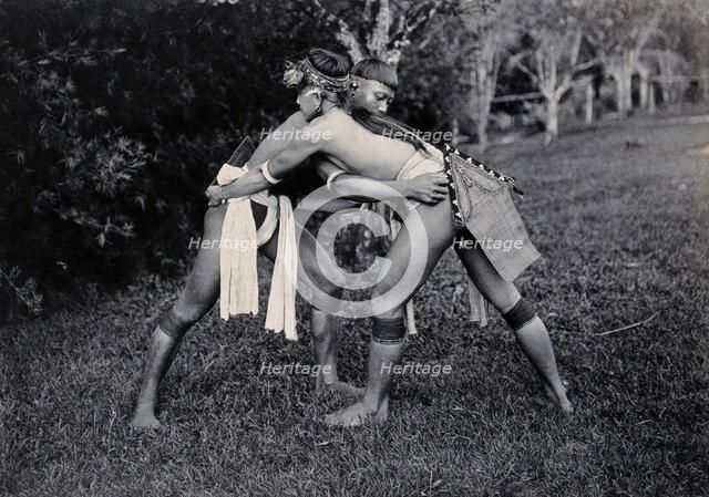Sarawak: two Kayans wrestling, c1900. Creator: Unknown.