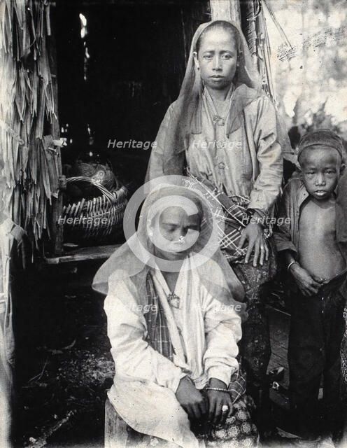 Sarawak: two Malay women and a child, c1900. Creator: Unknown.