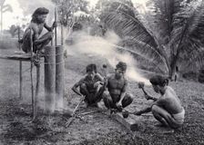 Sarawak: a Kalabit smithy, c1900. Creator: Unknown