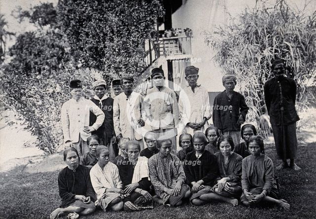 Sarawak: people of the Sibuyaus tribe from the Lundu region, c1900. Creator: Unknown.