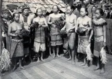 Sarawak: Sea Dayak men at a head feast, c1900. Creator: Unknown