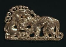Sarmatian gold open-work plaque showing a tiger and fantastic beast
