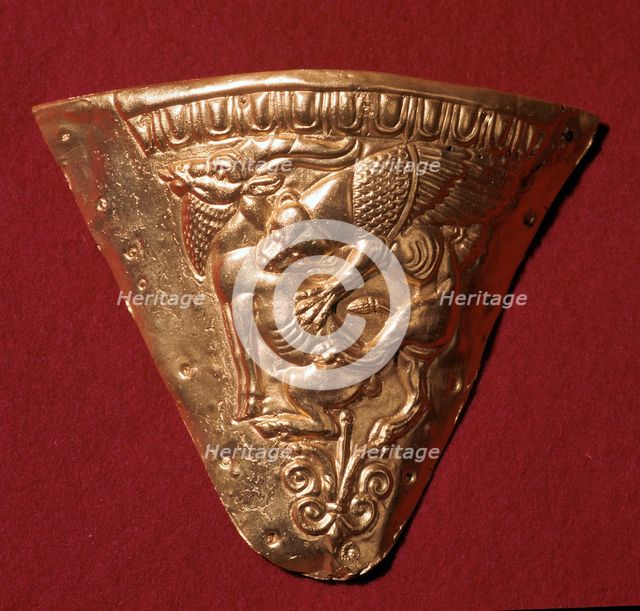 Scythian gold plate showing a winged panther attacking a goat. Artist: Unknown