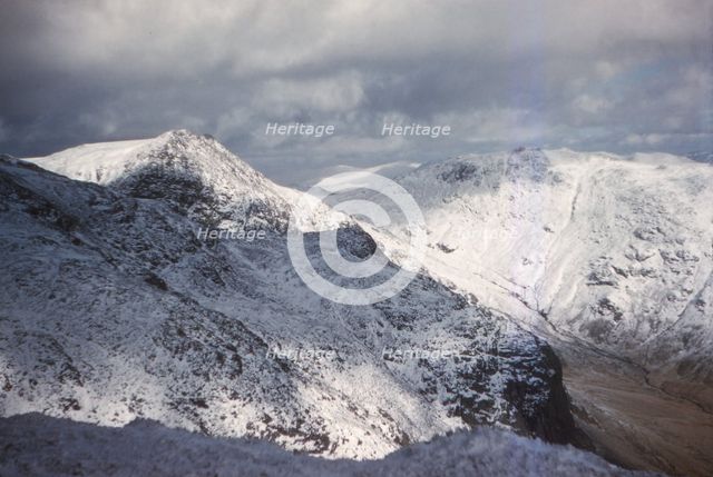 Scafell and Scafell Pike in Winter, English Lake District, Cumbria, 20th century. Artist: CM Dixon.