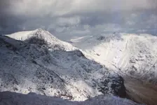 Scafell and Scafell Pike in Winter, English Lake District, Cumbria, 20th century. Artist: CM Dixon