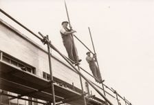 Scaffolders erecting scaffolding, 1951