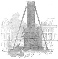 Scaffolding for sawing the base of the column in the Place Vendôme, Paris, 1871. Creator: Unknown