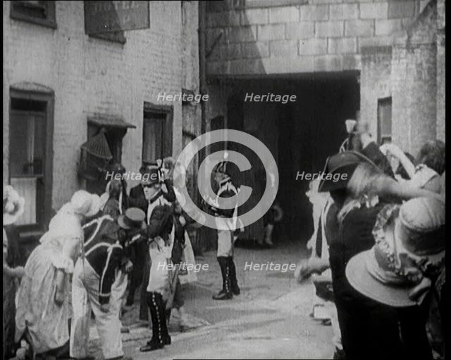Scene from the Feature Film 'Nelson': Crowds of Actors in Period Costume Being..., 1920s. Creator: British Pathe Ltd.