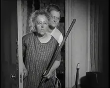 Scene from the Film The Compulsory Husband': Two Actors Portraying Cleaners Carrying..., 1920s. Creator: British Pathe Ltd