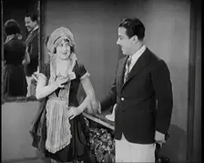 Scene from the Film The Compulsory Husband': The Actor Monty Banks Arriving at the House..., 1920s. Creator: British Pathe Ltd