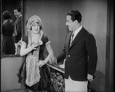 Scene from the Film The Compulsory Husband': The Actor Monty Banks Arriving at the House..., 1920s. Creator: British Pathe Ltd