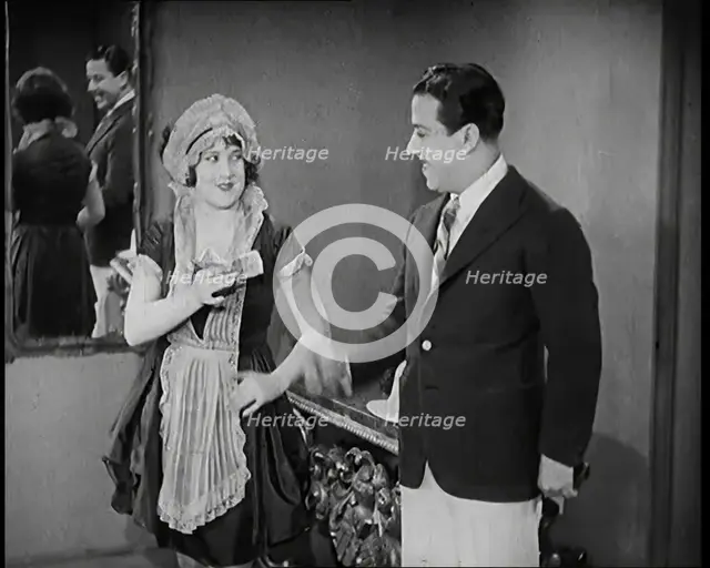 Scene from the Film 'The Compulsory Husband': The Actor Monty Banks Arriving at the House..., 1920s. Creator: British Pathe Ltd.