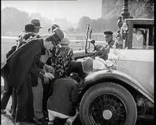Scene from the Film The Compulsory Husband': The Actor Monty Banks Causes an Accident..., 1920s. Creator: British Pathe Ltd