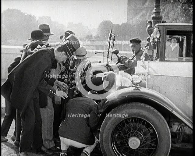 Scene from the Film 'The Compulsory Husband': The Actor Monty Banks  Causes an Accident..., 1920s. Creator: British Pathe Ltd.