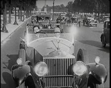 Scene from the Film The Compulsory Husband': The Actor Monty Banks Driving a Car With..., 1920s. Creator: British Pathe Ltd