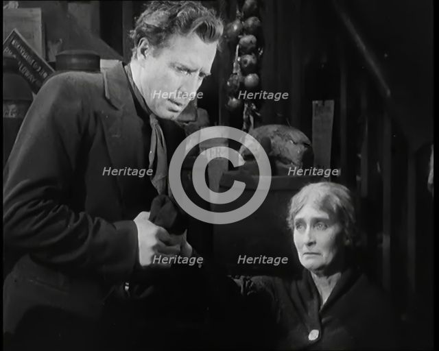 Scene from the Film 'The Informer':  Lars Hansen Arriving at the House of the Mother..., 1920s. Creator: British Pathe Ltd.