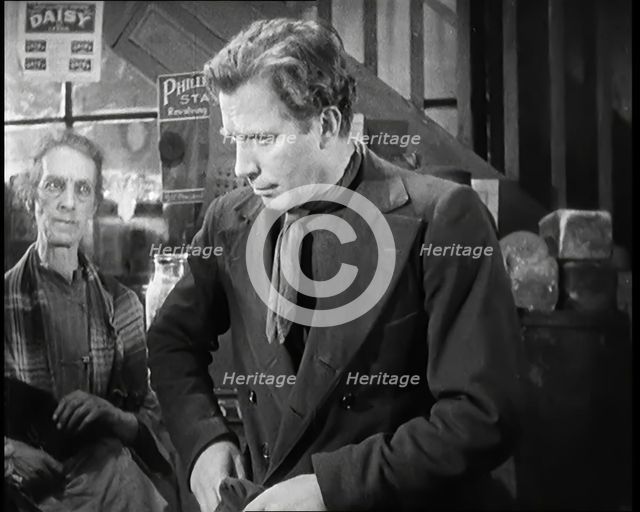Scene from the Film 'The Informer':  Lars Hansen Arriving at the House of the Mother..., 1920s. Creator: British Pathe Ltd.
