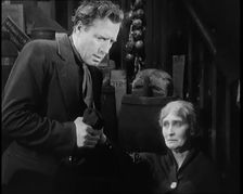 Scene from the Film The Informer': Lars Hansen Arriving at the House of the Mother..., 1920s. Creator: British Pathe Ltd