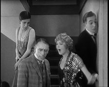 Scene from the Film Champagne': Betty Balfour Arguing With Her Companions, 1920s. Creator: British Pathe Ltd